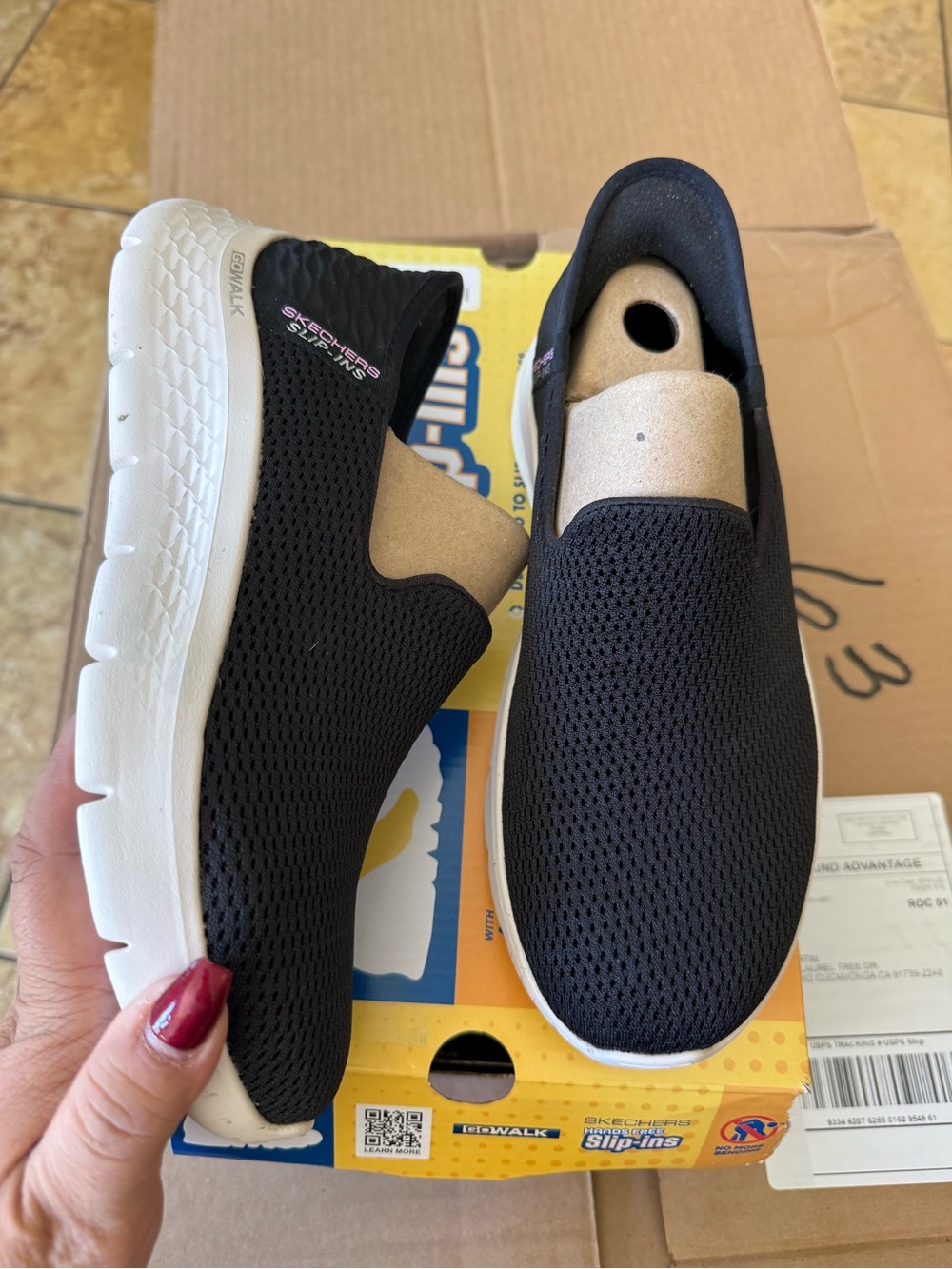 Skechers Women’s Black Slip-On Mesh Sneakers with White Sole
